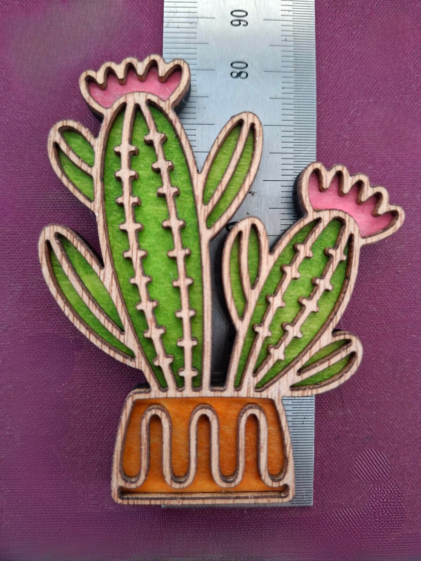 Hand coloured plant magnet