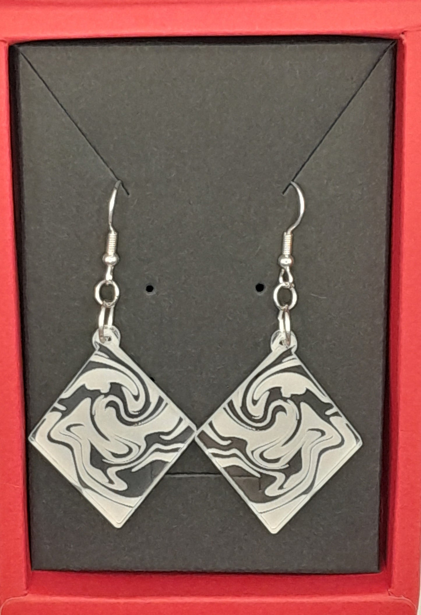 Diamond earrings - laser cut and engraved swirl