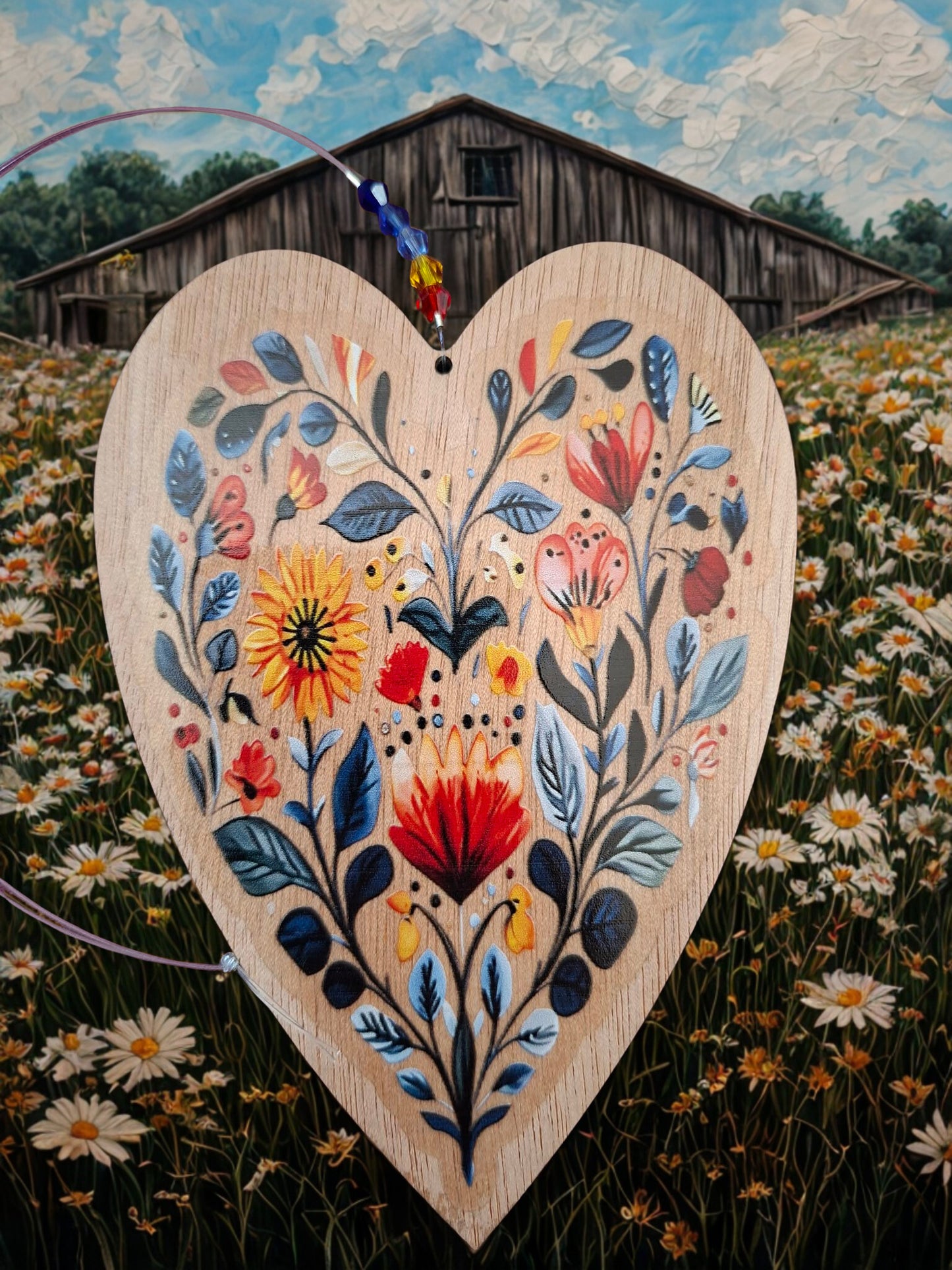 Hanging wooden heart with flowers