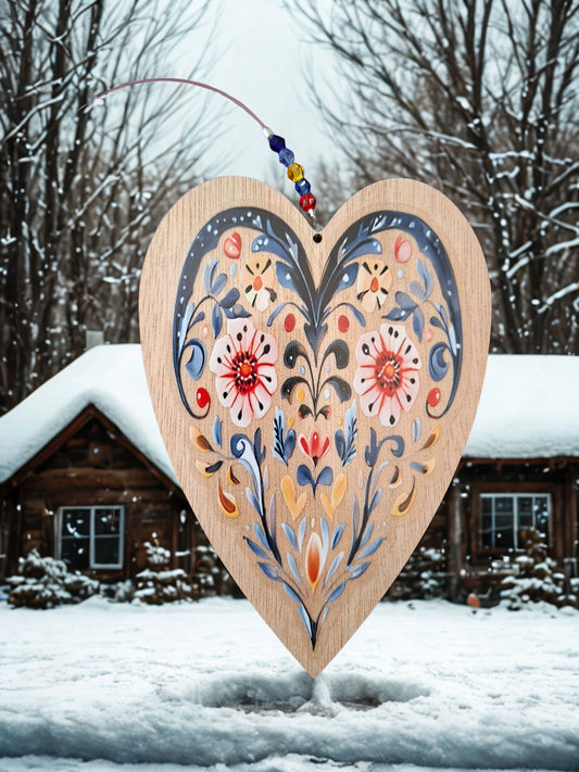 Hanging wooden heart with flowers