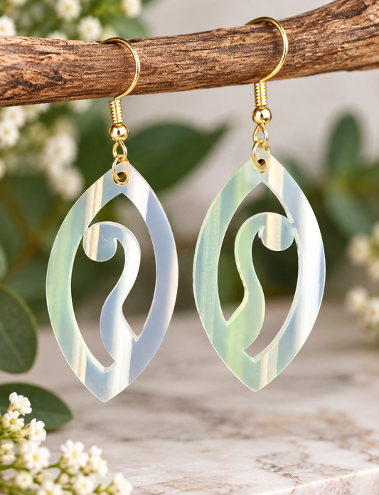 Pearlescent iridescent acrylic earrings with swirl cut-out design and gold-tone hooks, laser cut and made in New Zealand by Dopey Dog NZ.
