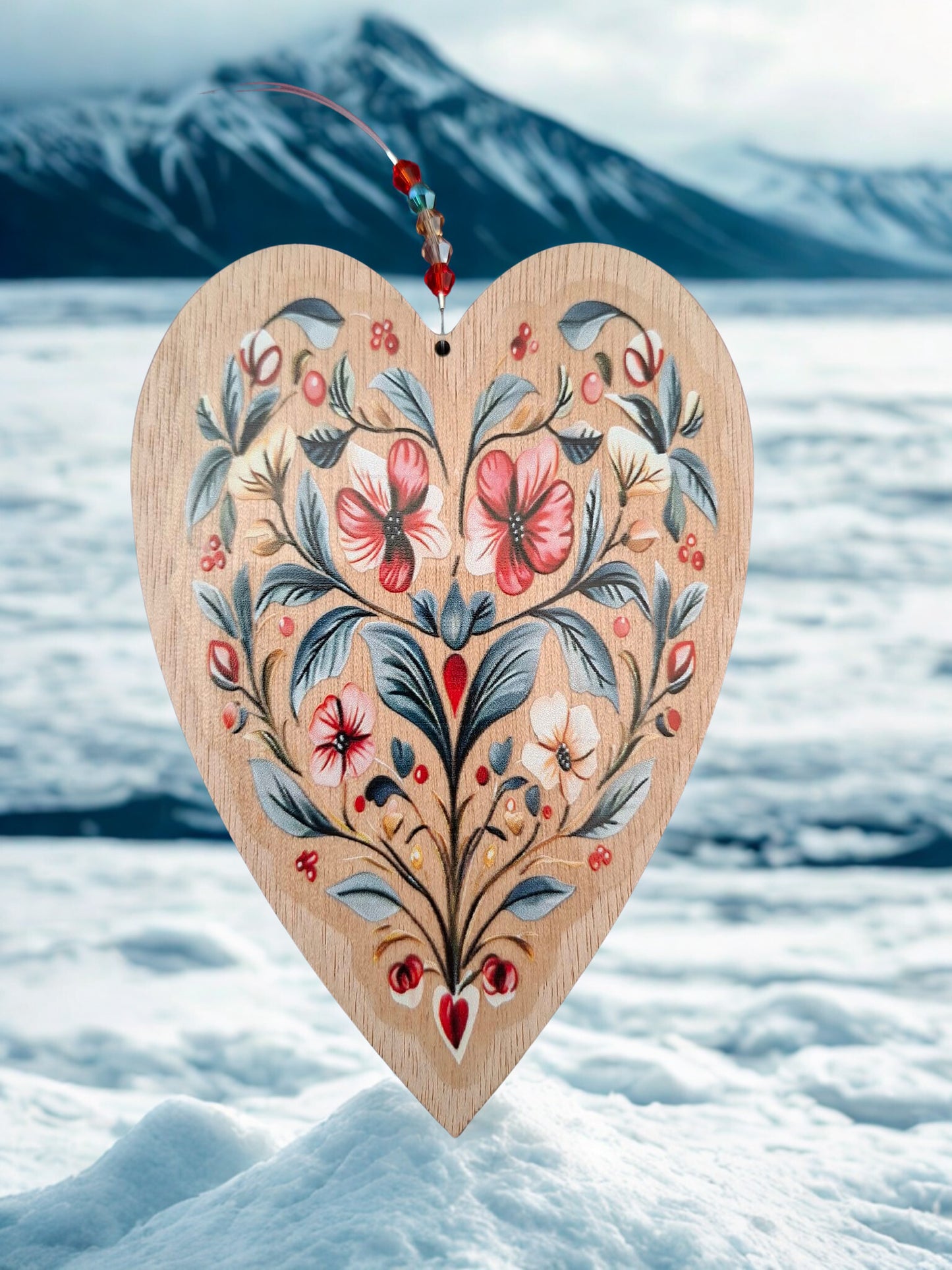 Hanging wooden heart with flowers