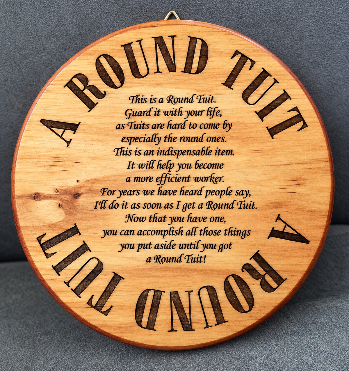 Round Tuit wooden novelty wall sign, laser engraved and hand-finished in New Zealand, approximately 160mm diameter