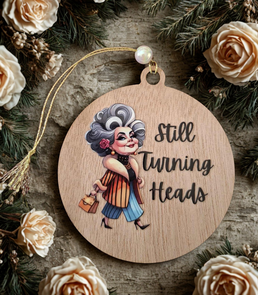 Still turning heads small hanging sign
