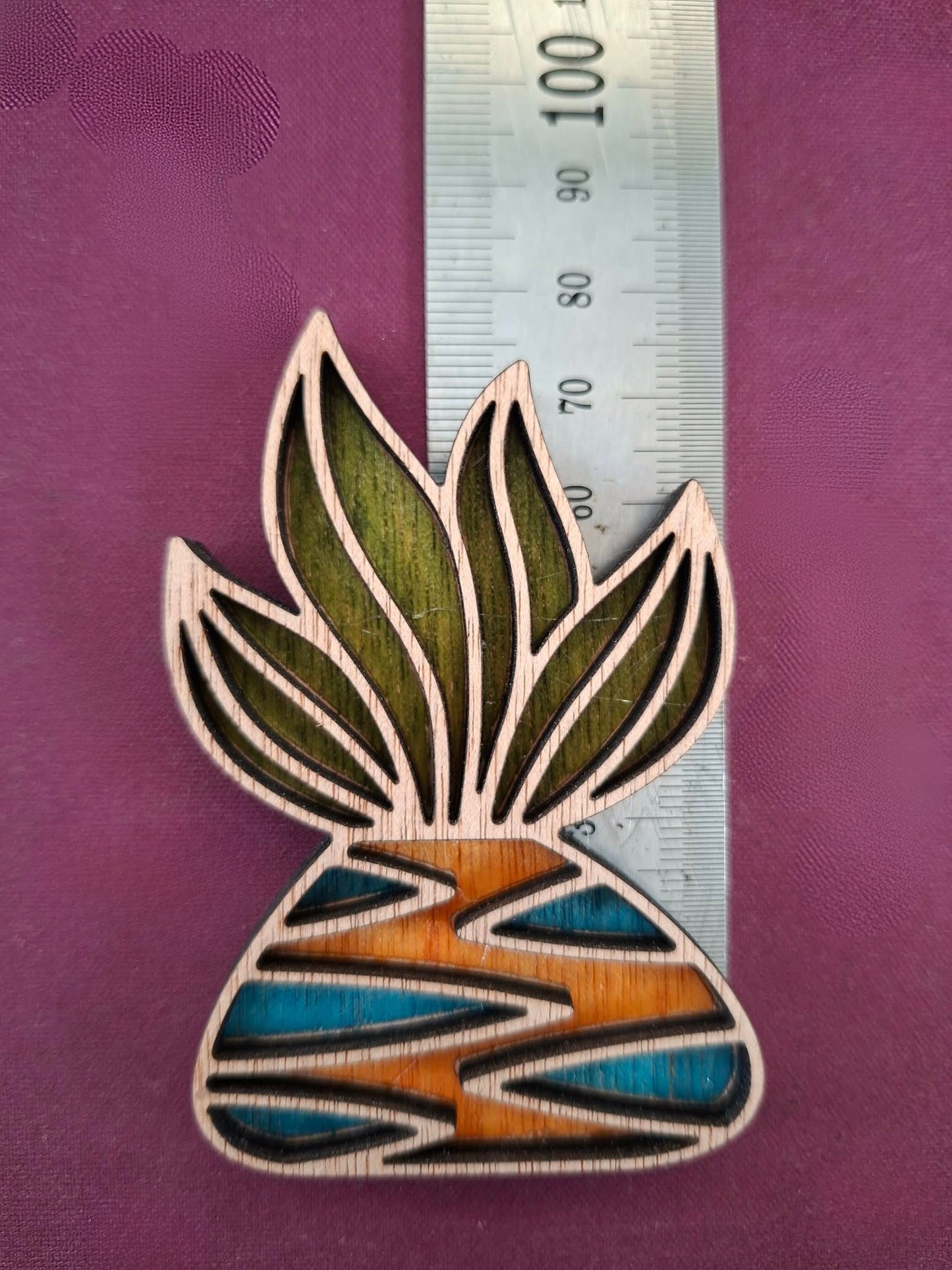 Hand coloured plant magnet