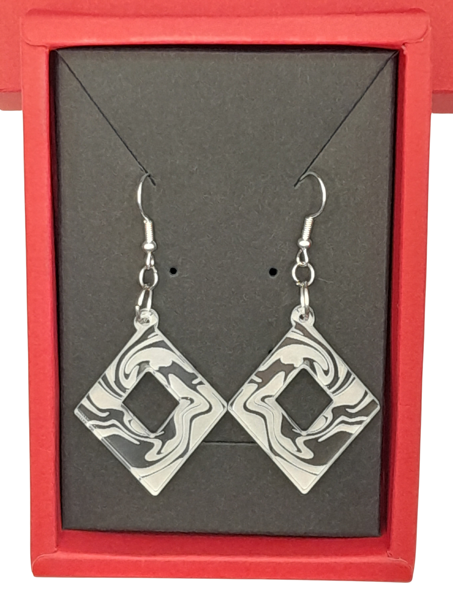 Diamond cut out earrings - laser cut and engraved swirl