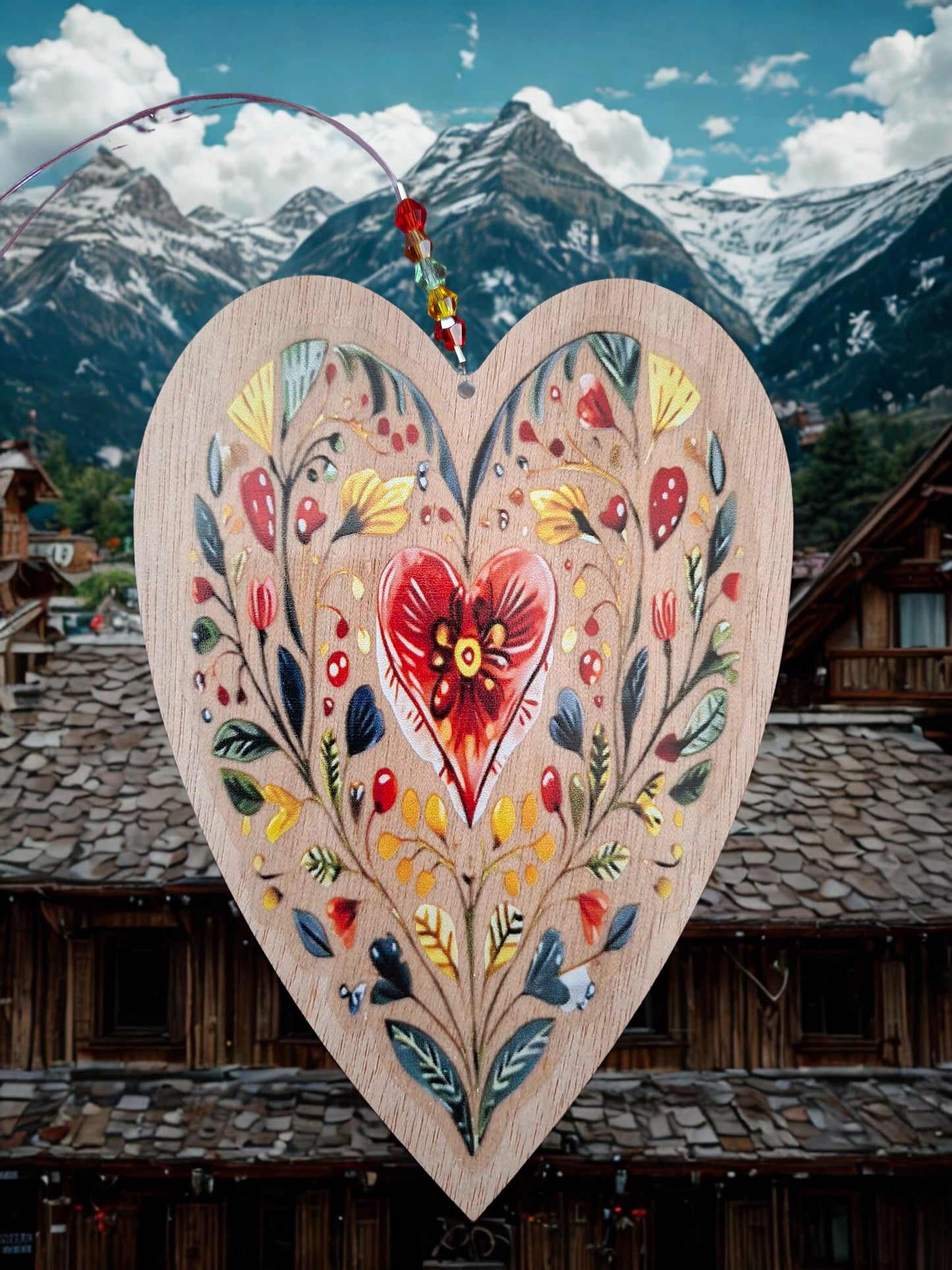 Hanging wooden heart with flowers