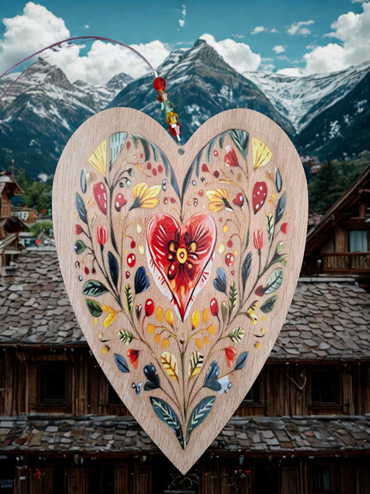 Hanging wooden heart with flowers
